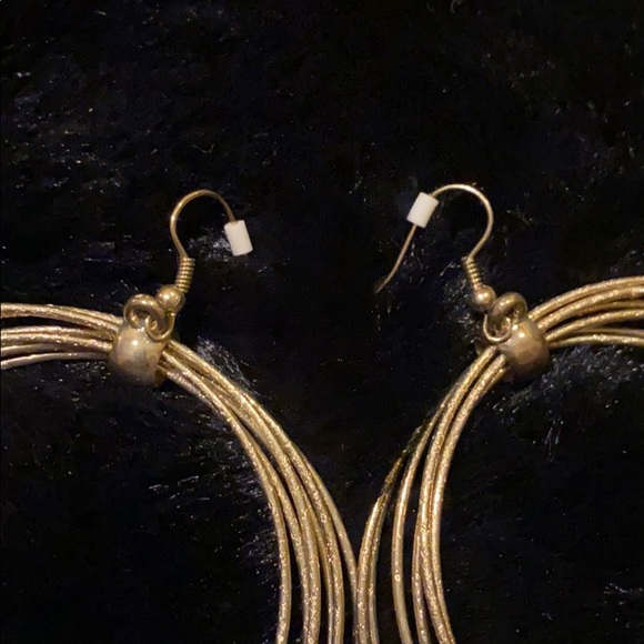 Fuego Gold Tone Hoop Earrings - Picture 5 of 6